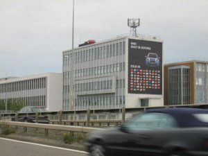 Red MINI on roof of MINI plant